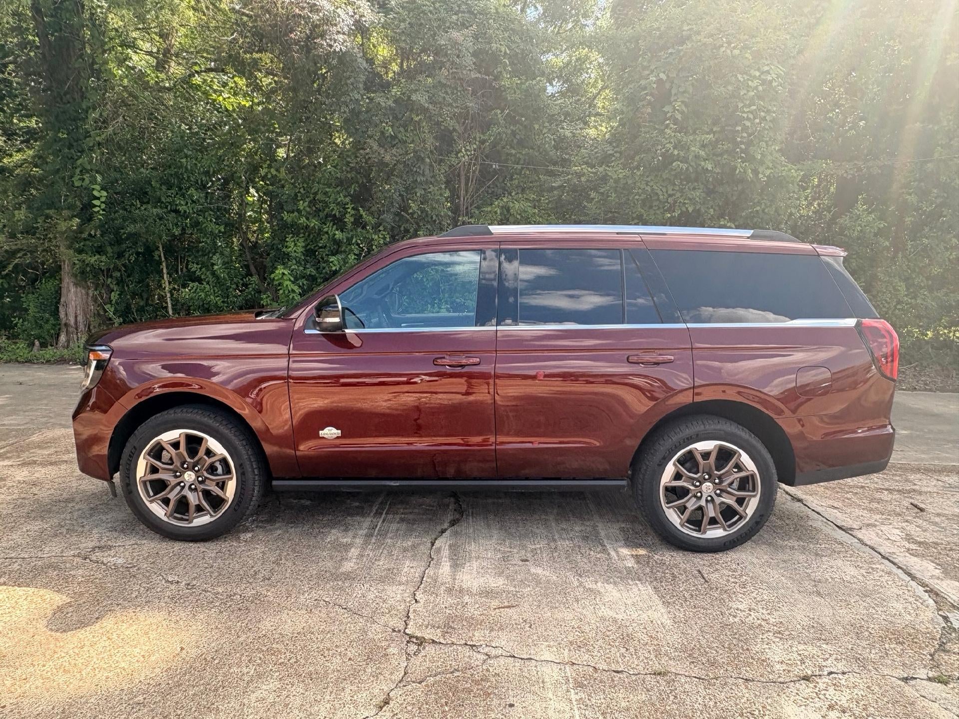 2027 Ford Expedition King Ranch in Bronze Fire Metallic Tinted Clearcoat — front three-quarter view