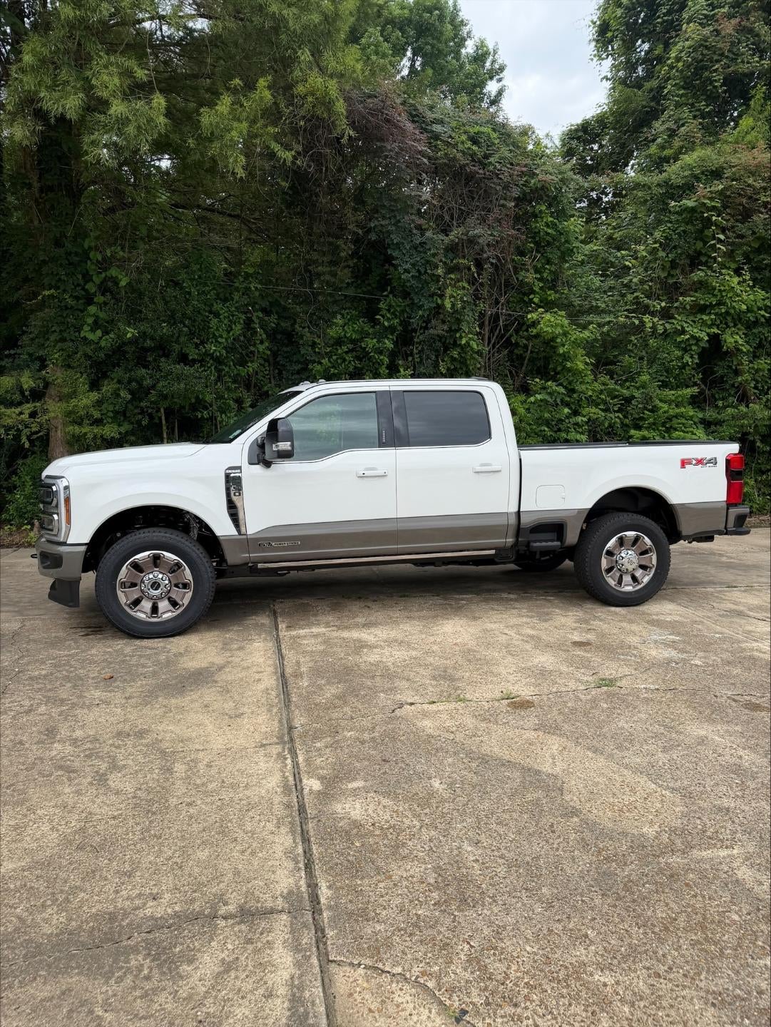 2026 Ford Super Duty F-250 King Ranch in Star White Metallic Tri-Coat — front three-quarter view