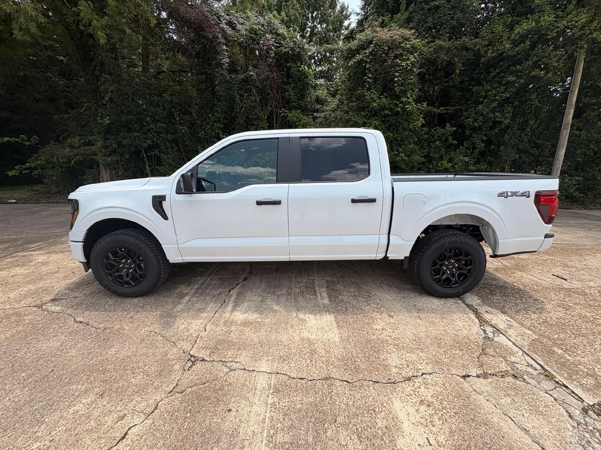 2026 Ford F-150 STX in Oxford White — front three-quarter view