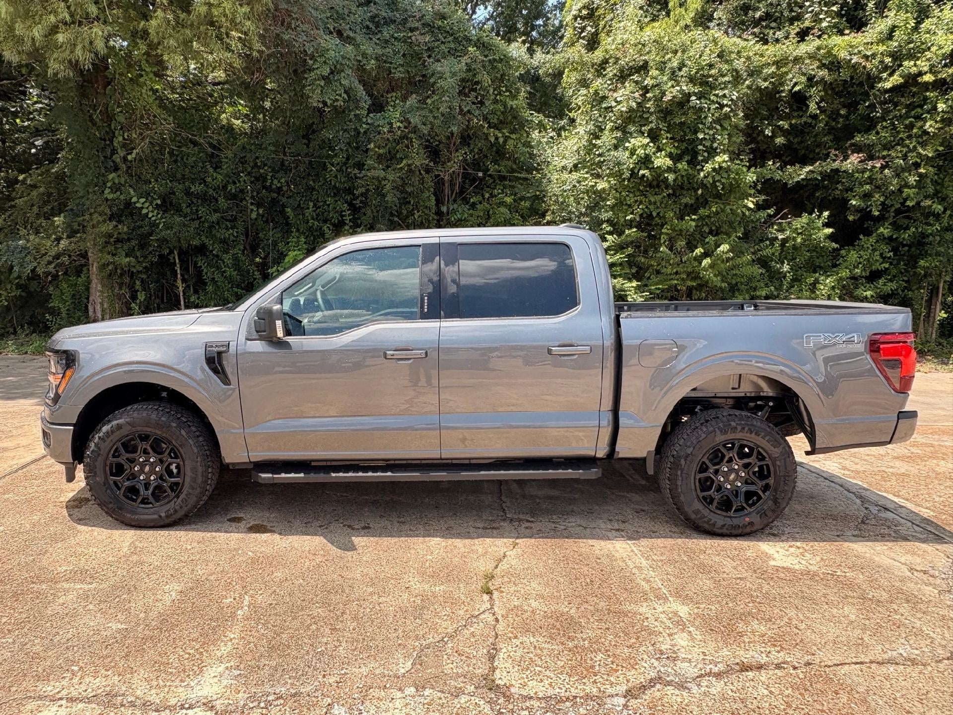 2026 Ford F-150 XLT in Carbonized Gray Metallic — front three-quarter view