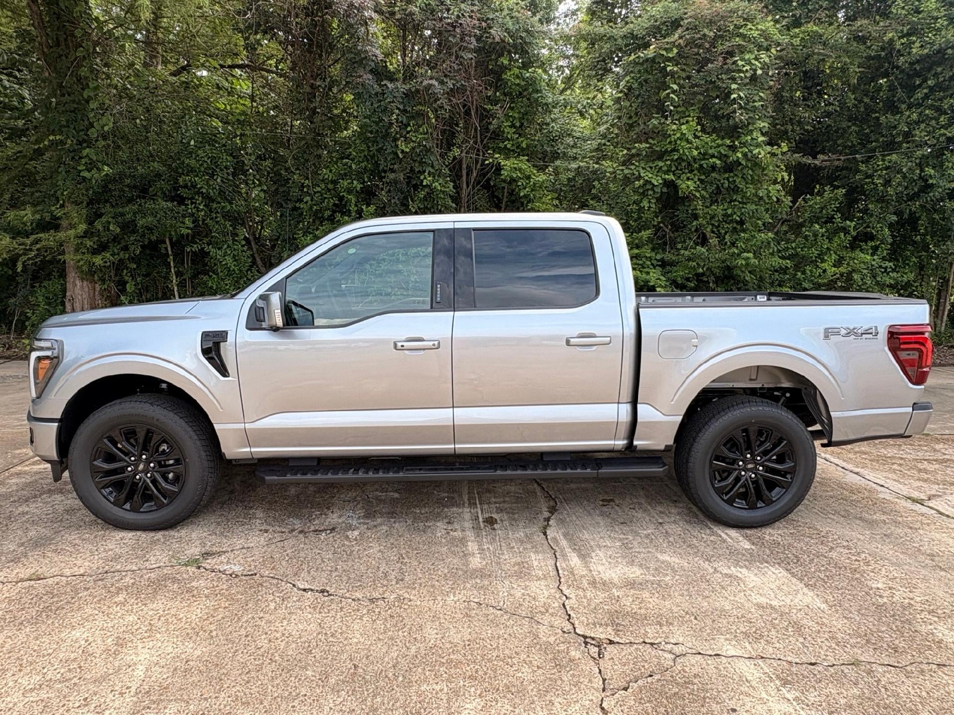 2026 Ford F-150 Lariat in Iconic Silver Metallic — front three-quarter view