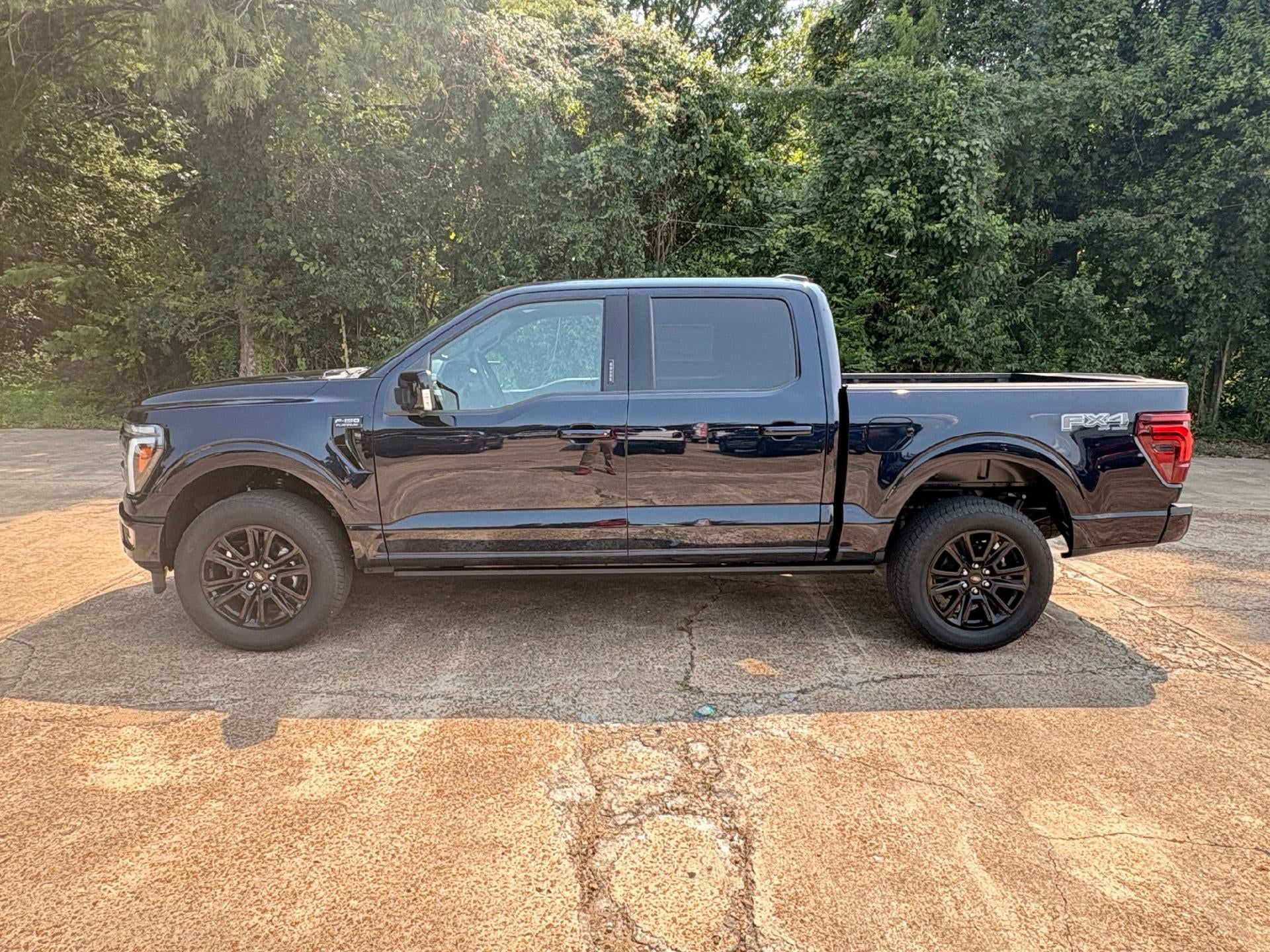 2026 Ford F-150 Platinum in Antimatter Blue Metallic — front three-quarter view